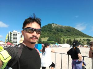 man selfie near beach at Mount Maunganui